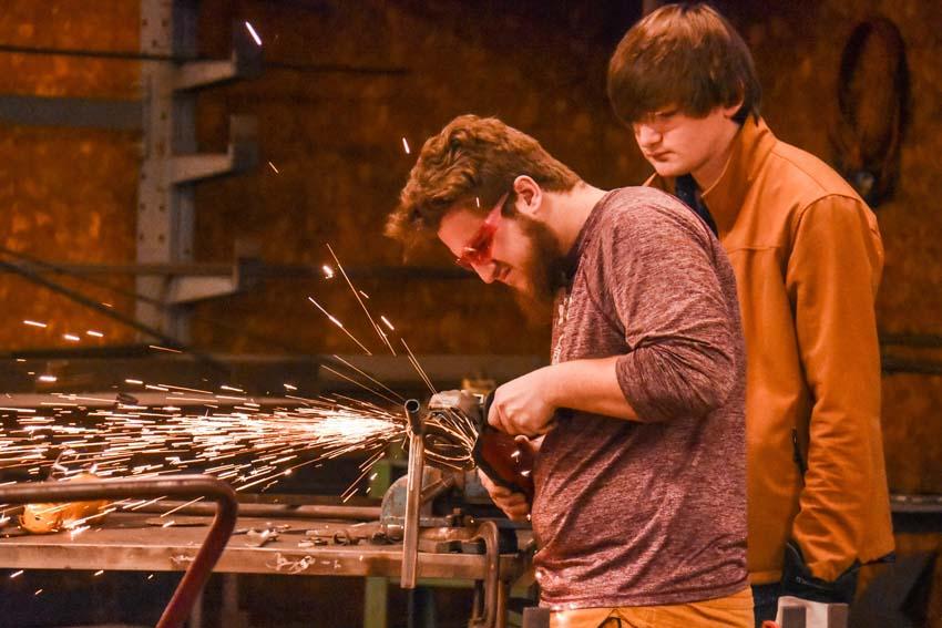 Images of students in Welding class.